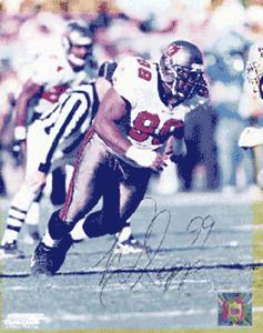 Warren Sapp Autographed / Signed Tampa Bay Buccaneers Football 8x10 Photo Free Shipping Pices