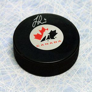 Jonathan Huberdeau Team Canada Autographed Hockey Puck With Credit Card For Sale