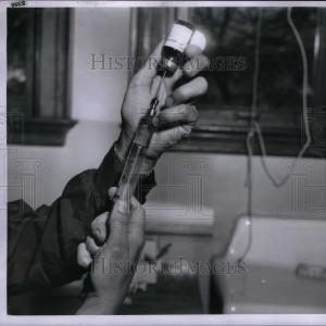 1955 Press Photo Medical Syringe Needle Being Filled With Mastercard Online