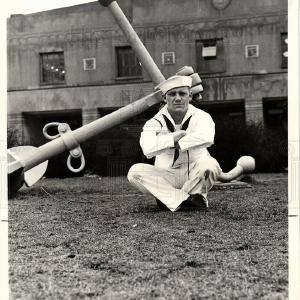 1942 Press Photo Cross Leg Squat Free Shipping Hot Sale