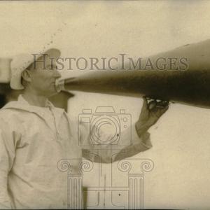 1911 Press Photo Person announcing through megaphone Explore Online
