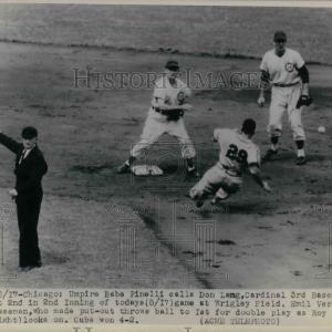 1948 Press Photo Umpire Babe Pinelli calls for out at Cardinals Don Lang. Pick A Best For Sale