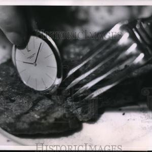 1953 Press Photo Knife blade thin timepiece display on Intl show in Paris Extremely For Sale