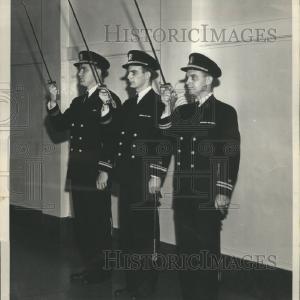1954 Press Photo Three great Officers rendering sword Visa Payment