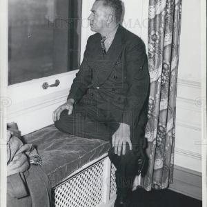 1936 Press Photo Cornelius Vanderbilt Jr Seated At Window Seat How Much