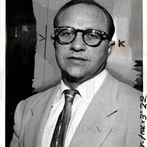 1957 Press Photo Lou R Jacobs Free Shipping Order