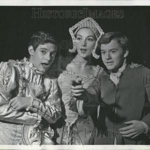 1957 Press Photo Young Actors in Theatrical Production Shop Offer