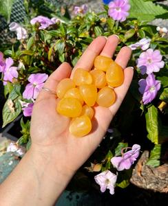 AAA High Quality Polished Sherbet Orange Calcite Tumbles Cheap Sale Wiki