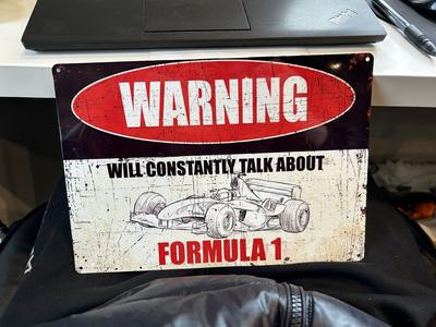 "warning will constantly talk about formula 1" sign With Mastercard Online
