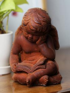 Rustic finish angel reading book With Mastercard Online